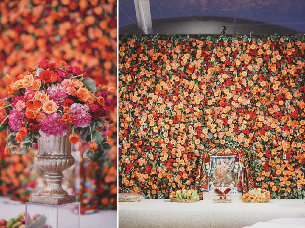 Pink orange and red florals covering an entire wall